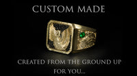 Custom Made Created From The Ground Up For You text on black background with hand engraved carved swan yellow gold signet ring next to it