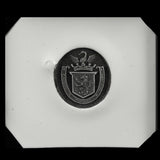 White wax impression of seal ring featuring swan, crown, shield, lion and banner with text.