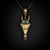 Large Smile Please hand crafted jewellery pendant. Hand crafted smile motif with horns in oxidised silver, 18ct yellow gold, rose gold, white gold and fine gold set with one amethyst. On chain on black background.